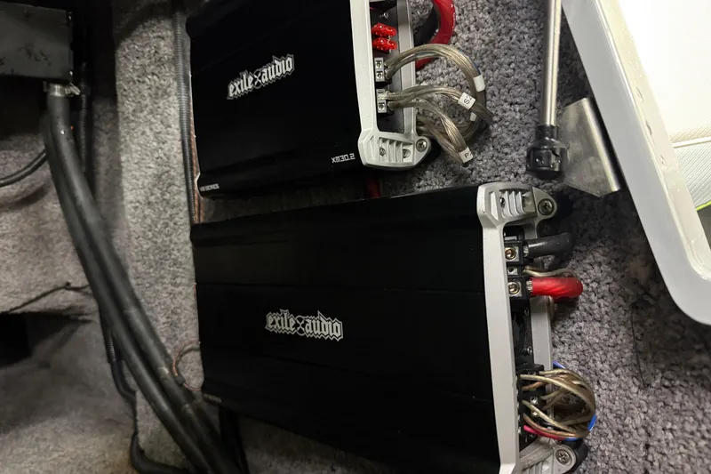 Slide: The Image of Car audio amplifiers installed in a 2015 MB B-52 23 Widebody boat. - 21