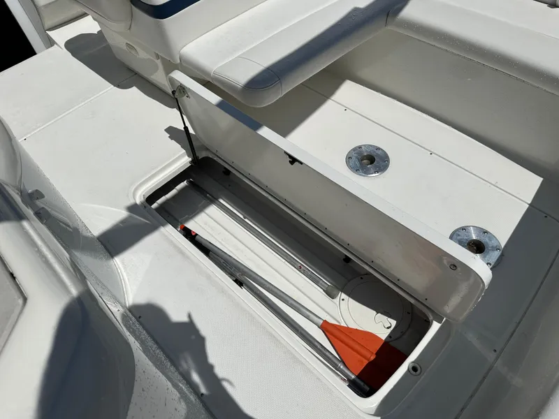 Slide: The Image of Open storage compartment on a 2000 Formula 330 SS boat deck. - 27