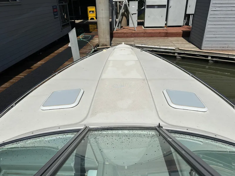 Slide: The Image of Bow view of 2000 Formula 330 SS boat docked at marina. - 30