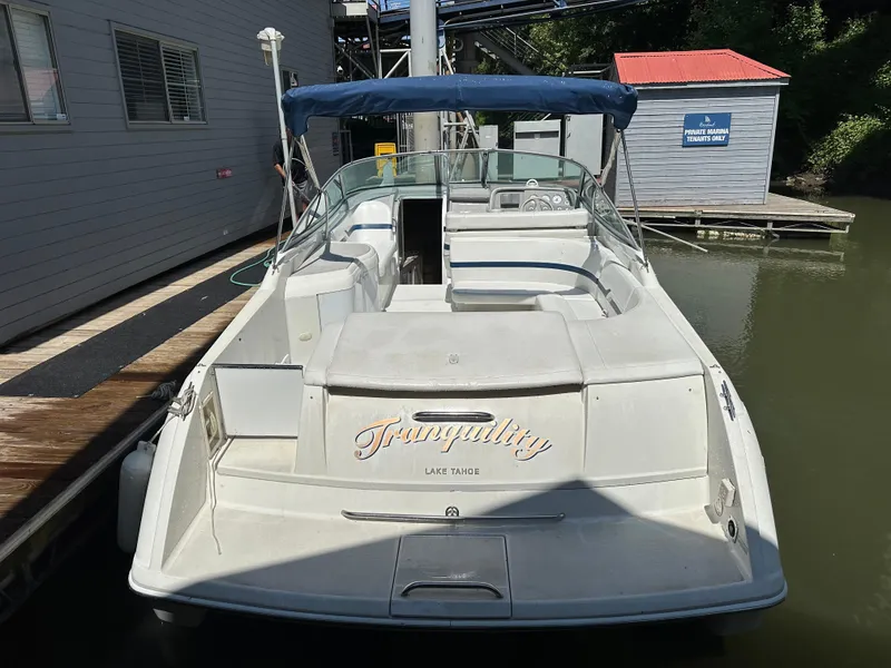 Slide: The Image of 2000 Formula 330 SS boat docked, featuring "Tranquility" on the stern, Lake Tahoe. - 4