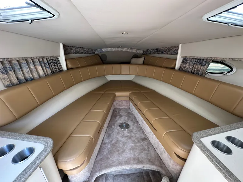 Slide: The Image of Interior of a 2000 Formula 330 SS boat with tan leather seating. - 40