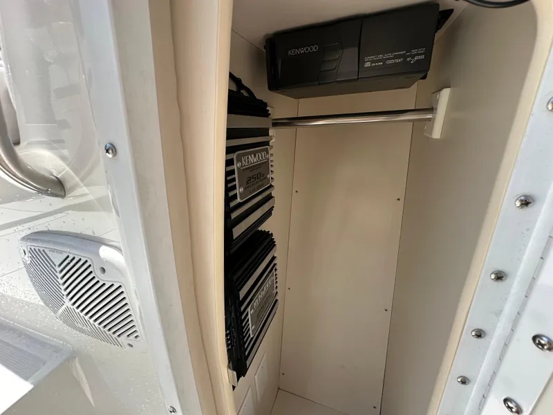 Slide: The Image of Audio equipment in a 2000 Formula 330 SS boat, featuring Kenwood components. - 48