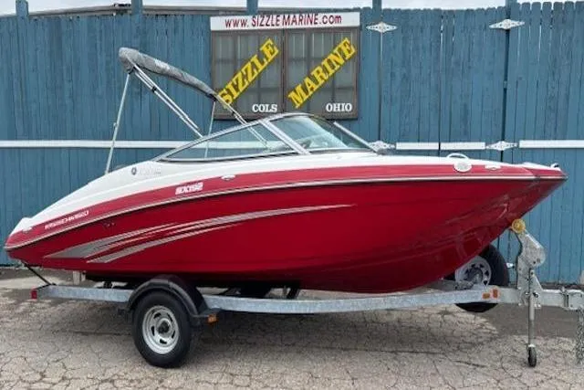 The Image of 2015 Yamaha Boats SX192 in red on trailer, displayed at Sizzle Marine, Ohio. - 0
