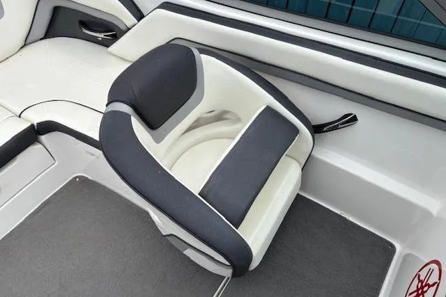 Slide: The Image of 2015 Yamaha Boats SX192 interior seating, featuring sleek black and white upholstery. - 20