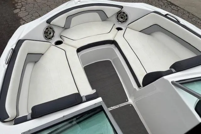Slide: The Image of 2015 Yamaha Boats SX192 interior with spacious seating and modern design. - 8