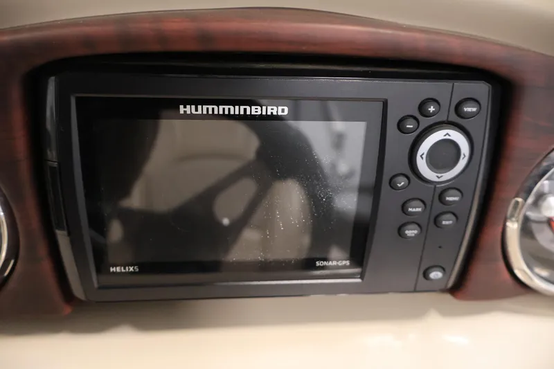 Slide: The Image of Humminbird Helix 5 sonar GPS unit on 2016 Berkshire 23E STS dashboard. - 24