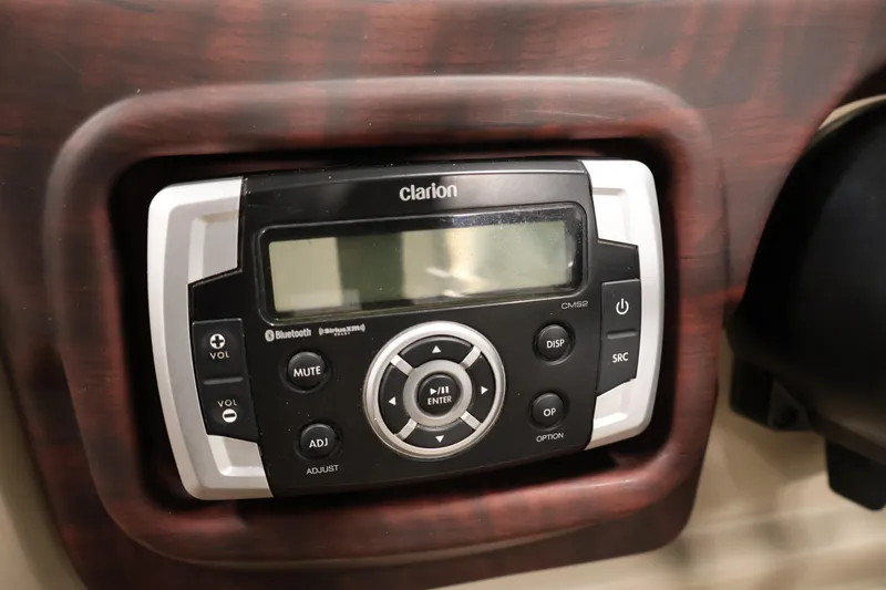 Slide: The Image of Clarion audio system in 2016 Berkshire 23E STS, featuring Bluetooth connectivity. - 26
