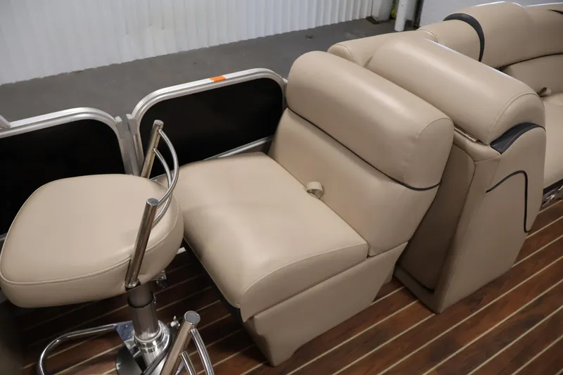 Slide: The Image of Luxurious seating on 2016 Berkshire 23E STS boat with beige upholstery and sleek design. - 30