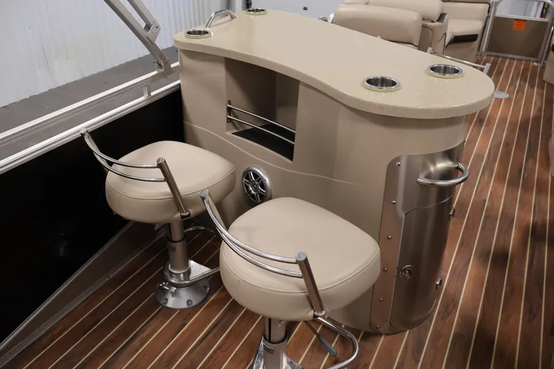 Slide: The Image of Interior of a 2016 Berkshire 23E STS boat with bar stools and counter. - 33