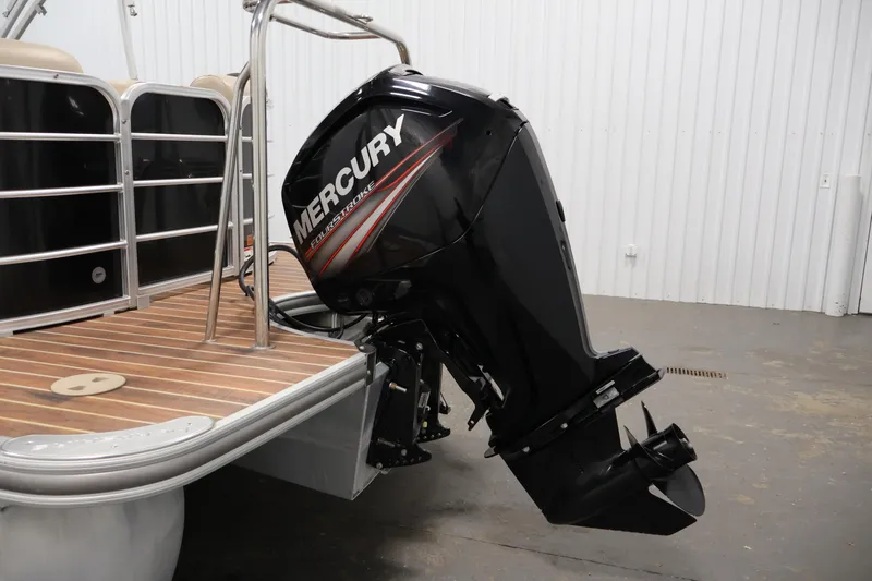 Slide: The Image of 2016 Berkshire 23E STS pontoon boat with Mercury FourStroke outboard motor. - 42
