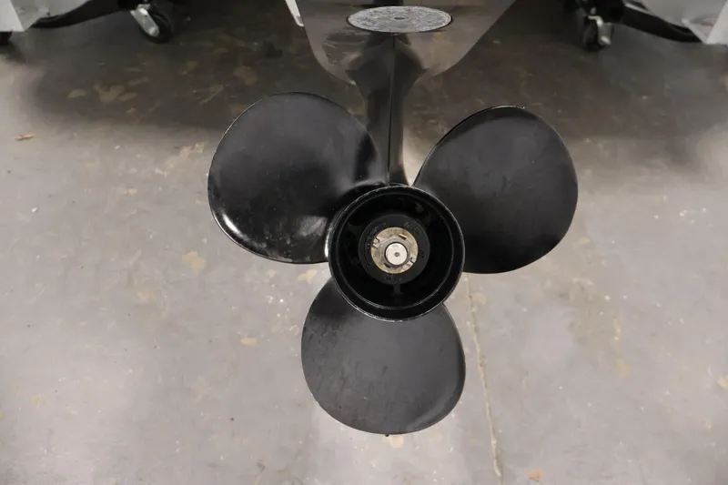 Slide: The Image of Propeller of a 2016 Berkshire 23E STS boat on a concrete floor. - 45
