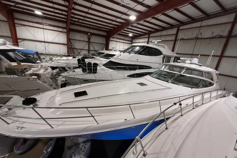 The Image of Indoor storage of multiple yachts, featuring a 2000 Sea Ray Sundancer 540. - 0