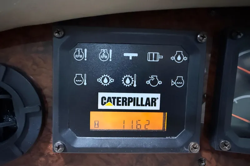 Slide: The Image of Caterpillar engine control panel on 2000 Sea Ray Sundancer 540 yacht. - 15