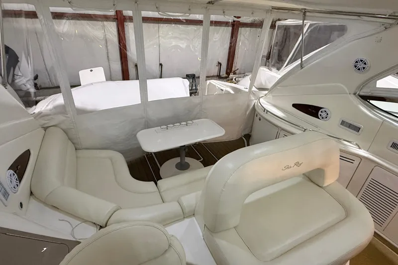 Slide: The Image of Luxurious interior of 2000 Sea Ray Sundancer 540 yacht with plush seating and table. - 17