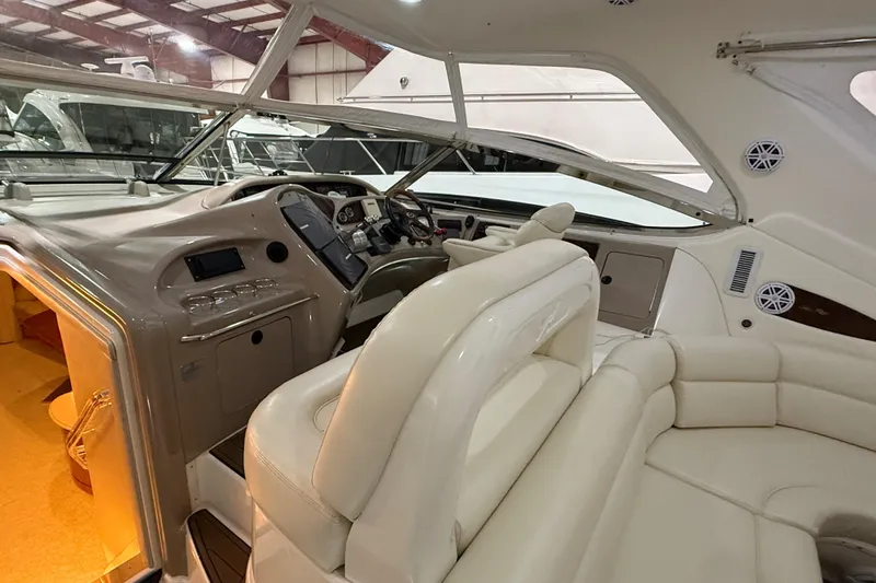 Slide: The Image of Interior view of 2000 Sea Ray Sundancer 540 yacht with luxurious seating and helm. - 20