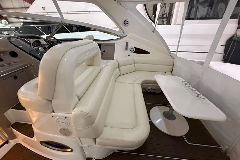 Slide: The Image of Luxurious interior of 2000 Sea Ray Sundancer 540 yacht with plush seating and table. - 22