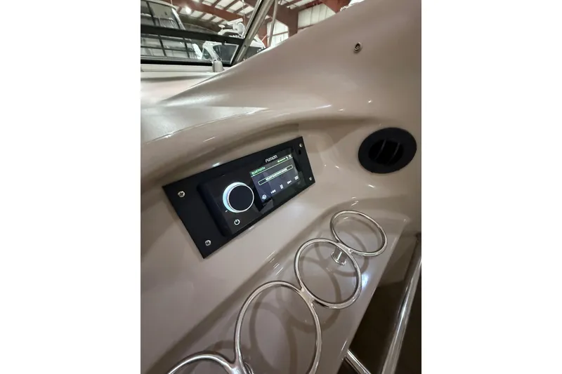 Slide: The Image of Control panel and cup holders on a 2000 Sea Ray Sundancer 540 yacht. - 24