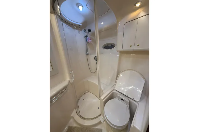 Slide: The Image of Luxurious bathroom in 2000 Sea Ray Sundancer 540 yacht with shower and toilet. - 31