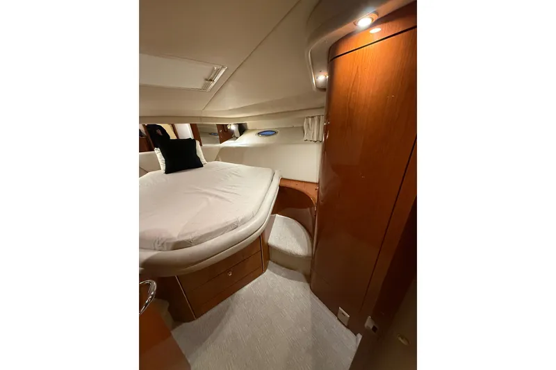 Slide: The Image of Luxurious cabin interior of 2000 Sea Ray Sundancer 540 yacht with cozy bed. - 36