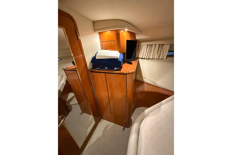 Slide: The Image of Luxurious cabin interior of 2000 Sea Ray Sundancer 540 yacht with wooden cabinetry. - 37