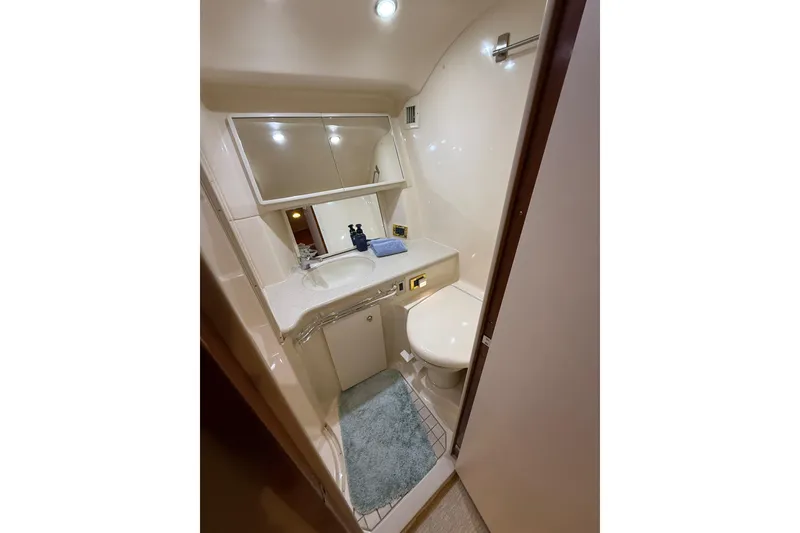 Slide: The Image of Luxurious bathroom interior of 2000 Sea Ray Sundancer 540 yacht, featuring modern amenities. - 40