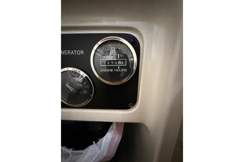 Slide: The Image of Close-up of Sea Ray Sundancer 540 engine hour meter, displaying 4960 hours. - 49