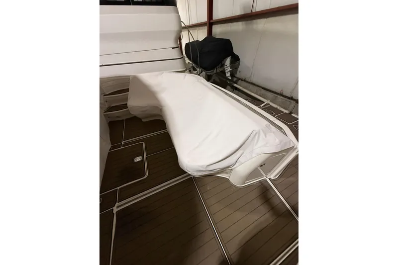 Slide: The Image of Covered seating area on a 2000 Sea Ray Sundancer 540 yacht deck. - 6