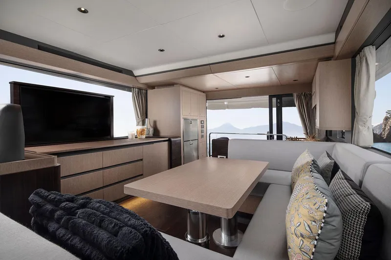 Slide: The Image of Luxurious interior of 2025 Sirena 48 yacht with modern furnishings and scenic views. - 12