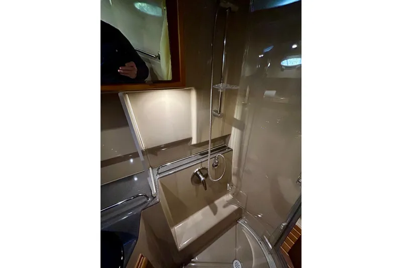 Slide: The Image of 2016 Cutwater C-30 CB yacht bathroom with shower and modern fixtures. - 11