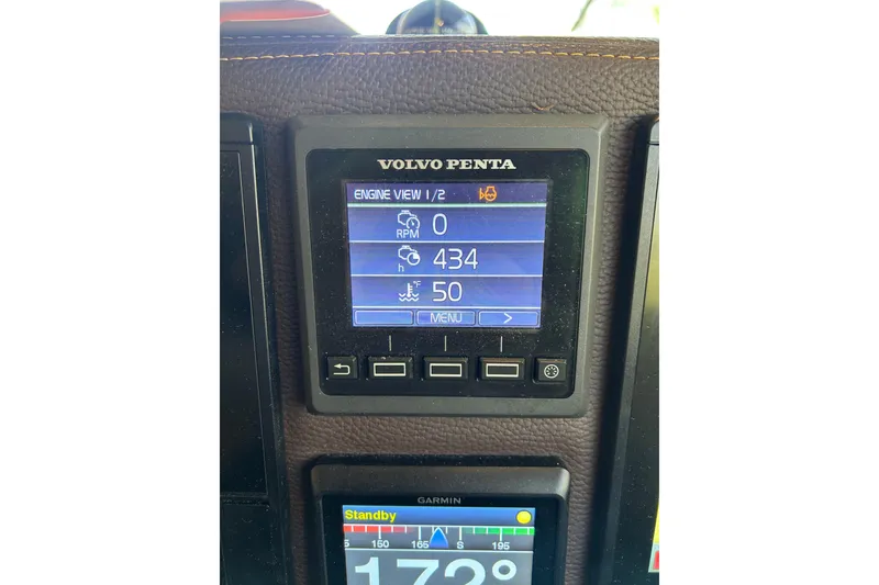 Slide: The Image of Volvo Penta engine display on 2016 Cutwater C-30 CB boat dashboard. - 35