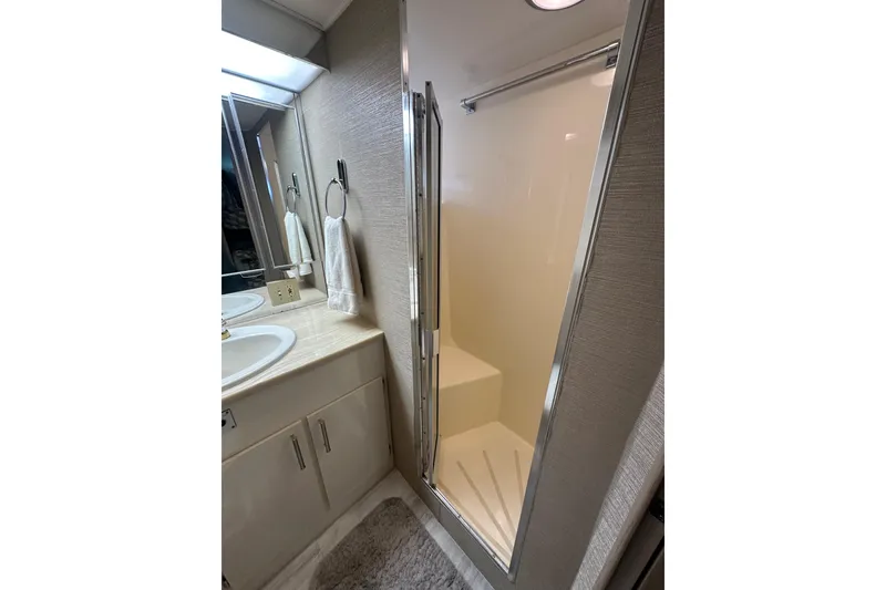Slide: The Image of Bathroom interior of 1992 Hatteras 65 Motor Yacht with shower and sink. - 30