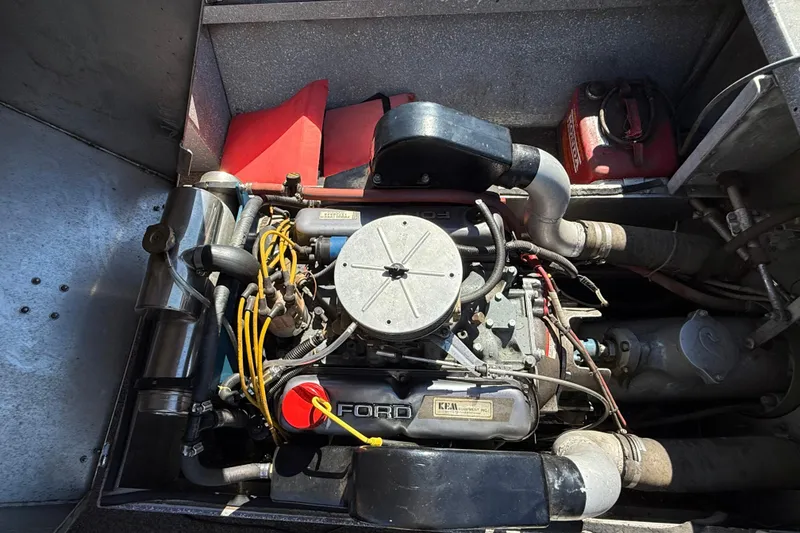 Slide: The Image of 1977 Alumaweld Inboard Jet engine with visible components and wiring. - 13