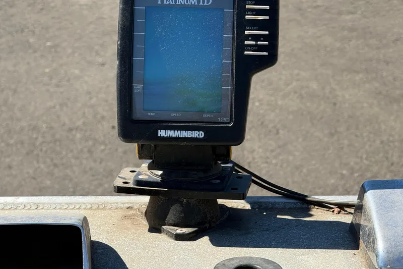 Slide: The Image of Fishfinder device on a 1977 Alumaweld Inboard Jet boat dashboard. - 14