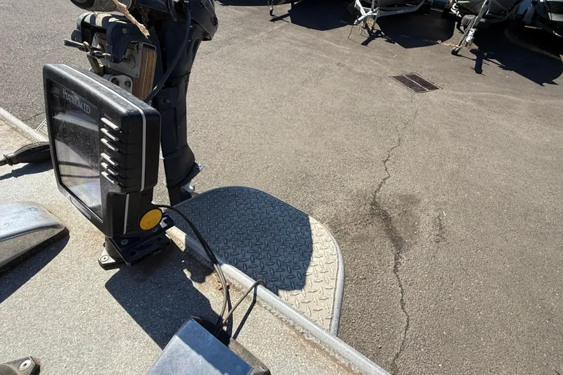 Slide: The Image of 1977 Alumaweld Inboard Jet boat with Humminbird fish finder on deck. - 17