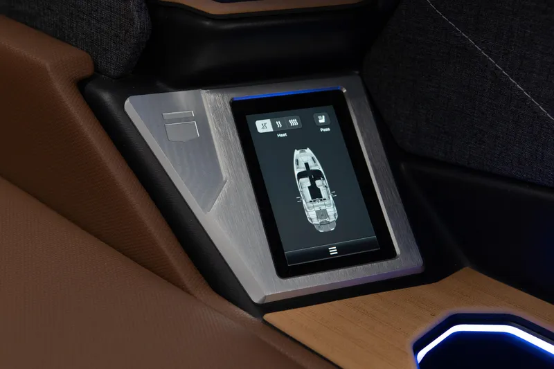 Slide: The Image of 2026 MasterCraft X24 touchscreen control panel with boat layout display. - 13
