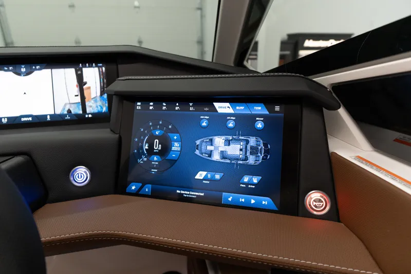 Slide: The Image of 2026 MasterCraft X24 dashboard with advanced touchscreen controls and navigation display. - 7