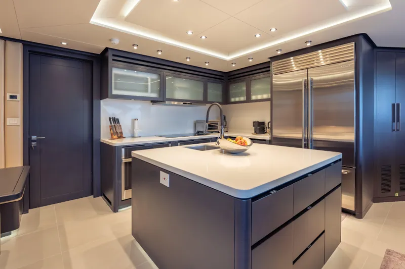 Slide: The Image of Luxurious yacht kitchen in 2025 Hargrave E Series, featuring modern appliances and sleek design. - 10