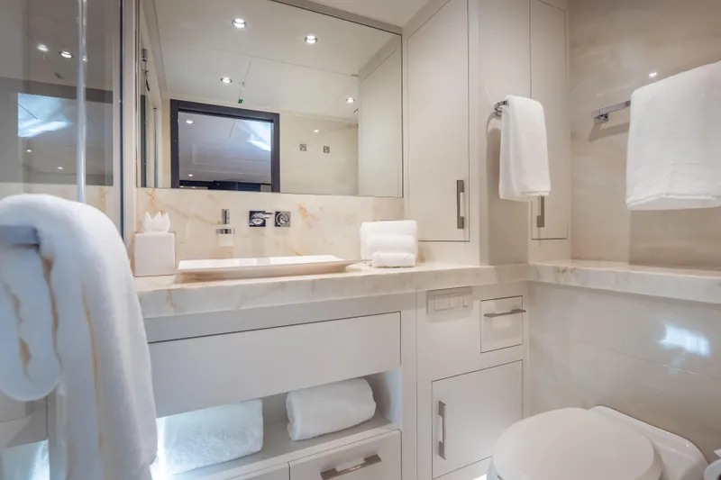 Slide: The Image of Luxurious bathroom in 2025 Hargrave E Series yacht, featuring elegant marble and modern fixtures. - 21