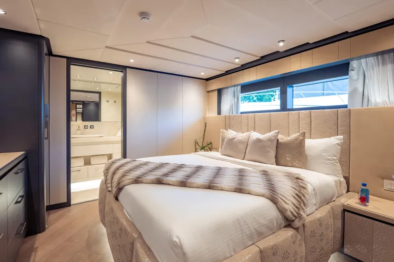 Slide: The Image of Luxurious bedroom interior of 2025 Hargrave E Series yacht with elegant decor and modern amenities. - 24