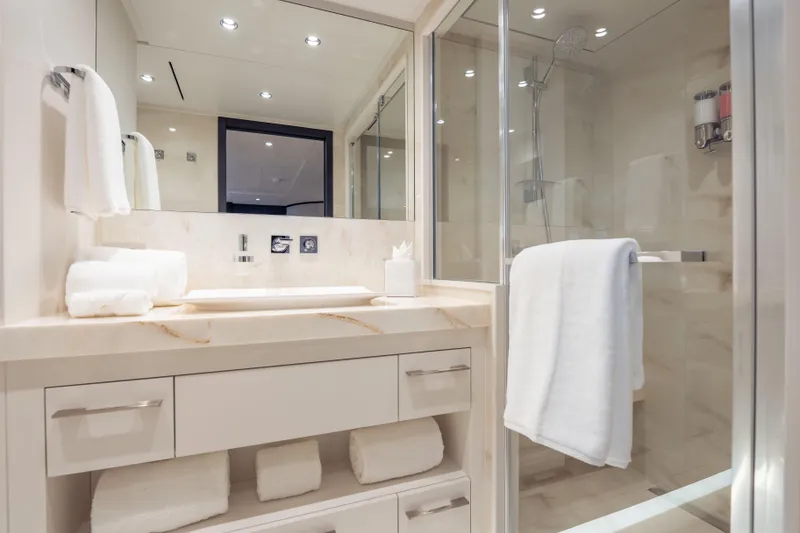 Slide: The Image of Luxurious bathroom in 2025 Hargrave E Series yacht, featuring elegant fixtures and modern design. - 25