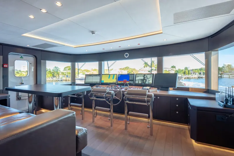 Slide: The Image of Luxurious 2025 Hargrave E Series yacht interior with modern navigation equipment and panoramic windows. - 31
