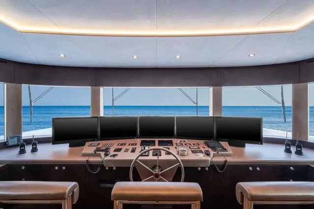 Slide: The Image of Luxurious Hargrave E Series 2025 yacht helm with panoramic ocean view and advanced controls. - 32