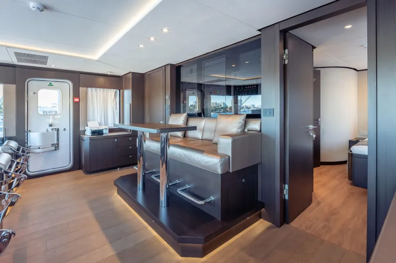 Slide: The Image of Luxurious interior of 2025 Hargrave E Series yacht with modern seating and elegant design. - 33