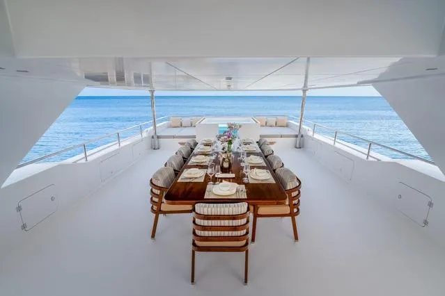 Slide: The Image of Luxurious dining area on 2025 Hargrave E Series yacht with ocean view. - 35