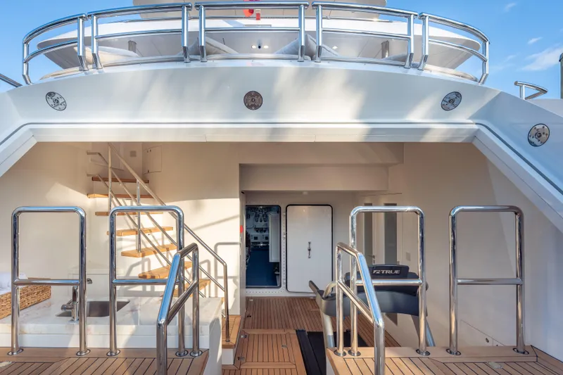 Slide: The Image of Luxurious 2025 Hargrave E Series yacht deck with modern stairs and sleek design. - 37