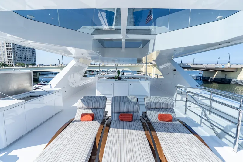 Slide: The Image of Luxurious 2026 Hargrave E Series yacht deck with sun loungers and modern design. - 40