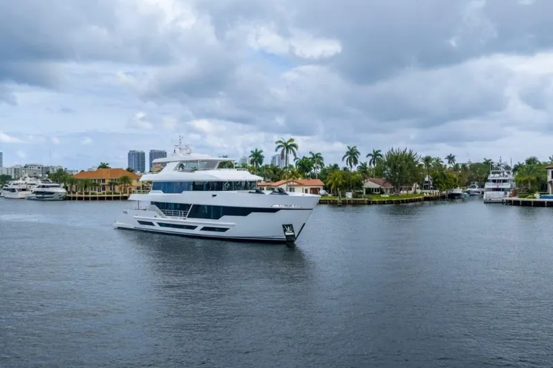 Slide: The Image of Luxurious 2026 Hargrave E Series yacht cruising in a scenic waterfront setting. - 46