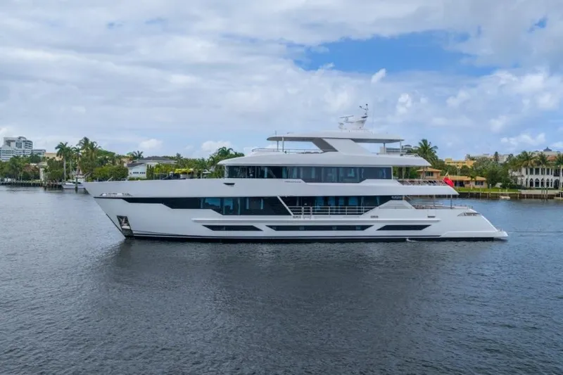 Slide: The Image of Luxurious 2026 Hargrave E Series yacht cruising on a scenic waterway. - 48