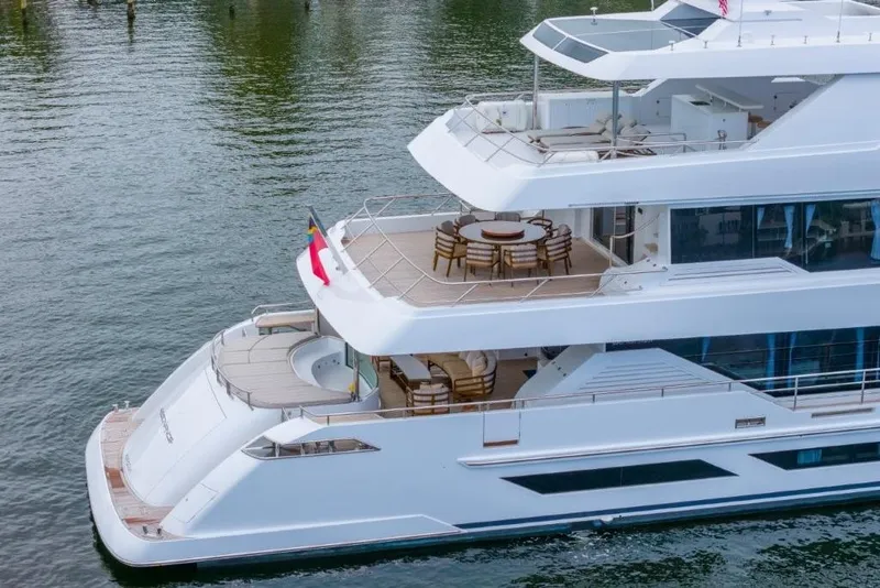 Slide: The Image of Luxurious 2026 Hargrave E Series yacht with spacious decks on calm water. - 57