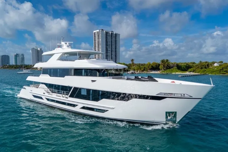 Slide: The Image of Luxurious 2026 Hargrave E Series yacht cruising in scenic coastal waters. - 58